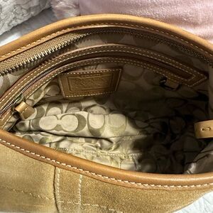 Coach, suede, brass hardware, nice stitching, some stains, see pictures